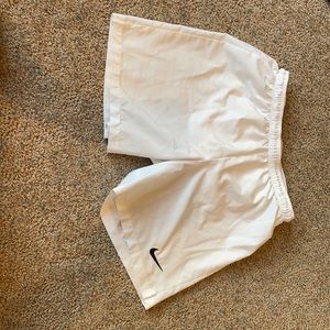 White Nike shorts